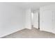 This bedroom features neutral carpets and white walls at 3516 Waldrop Trl, Decatur, GA 30034