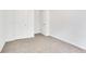 This bedroom features neutral carpets and white walls at 3516 Waldrop Trl, Decatur, GA 30034