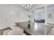 Open dining space connected to living area, featuring modern decor and ample lighting at 3516 Waldrop Trl, Decatur, GA 30034