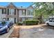 Charming townhome featuring a stone facade, neutral siding, and well-maintained landscaping at 3516 Waldrop Trl, Decatur, GA 30034