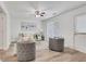 Bright living room featuring modern decor, plush seating, and wood-look floors at 3516 Waldrop Trl, Decatur, GA 30034