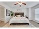 Tranquil main bedroom features a large window, comfortable bed, and calm ambiance at 3516 Waldrop Trl, Decatur, GA 30034