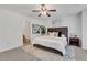 This bedroom features a ceiling fan and ensuite bathroom at 3516 Waldrop Trl, Decatur, GA 30034
