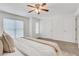 This main bedroom features a ceiling fan and two windows at 3516 Waldrop Trl, Decatur, GA 30034
