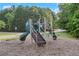 Community playground with a slide, climbing structures, and safe, padded ground at 3516 Waldrop Trl, Decatur, GA 30034