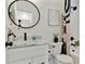 Chic bathroom with marble countertop, modern fixtures, and patterned shower curtain at 102 Rockyford, Atlanta, GA 30317