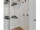 Organized closet with built-in shelving and hanging rods for ample storage at 102 Rockyford, Atlanta, GA 30317