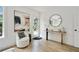 Bright entryway featuring hardwood floors, modern decor, and a stylish console table at 102 Rockyford, Atlanta, GA 30317