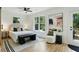 Bright main bedroom with a comfortable bed, stylish furnishings, and outdoor access at 102 Rockyford, Atlanta, GA 30317