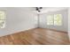 Spacious bedroom featuring three windows, and hardwood floors at 126 Marona Ne St, Atlanta, GA 30307