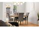 Well-lit dining area with a stylish light fixture and patio doors at 126 Marona Ne St, Atlanta, GA 30307