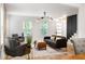 Inviting living room with natural light, comfortable seating, and stylish decor at 126 Marona Ne St, Atlanta, GA 30307