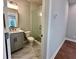 This bathroom features a gray vanity, shower and commode in separate enclosure at 285 Briscoe Way # 2, Alpharetta, GA 30009