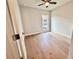 Bright bedroom with hardwood floors, ceiling fan, and natural light at 285 Briscoe Way # 2, Alpharetta, GA 30009