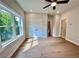 This bedroom features hardwood floors, large windows, ceiling fan and natural light at 285 Briscoe Way # 2, Alpharetta, GA 30009