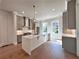 Bright, modern kitchen with stainless steel appliances, gray cabinets and large island with pendant lighting at 285 Briscoe Way # 2, Alpharetta, GA 30009
