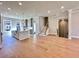 Modern living room features hardwood floors, and a spacious open-concept design at 285 Briscoe Way # 2, Alpharetta, GA 30009
