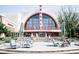Regal Cinemas movie theater at Avalon, featuring a grand entrance with fountains and outdoor seating at 285 Briscoe Way # 2, Alpharetta, GA 30009