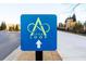 Alpha Loop sign for a safe, walkable path surrounded by green landscapes and modern design at 285 Briscoe Way # 2, Alpharetta, GA 30009