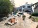 Gorgeous backyard is an oasis with a pool, fire pit, outdoor seating, and lush landscaping at 4030 River Ridge Se, Marietta, GA 30067