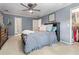 Bedroom featuring a bed with gray bedding, dark wood furniture, and an ensuite bathroom at 4030 River Ridge Se, Marietta, GA 30067