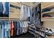Walk-in closet with built-in shelving and organized hanging space at 4030 River Ridge Se, Marietta, GA 30067