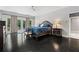 Spacious main bedroom with a bed, hardwood floors, and lots of natural light at 4030 River Ridge Se, Marietta, GA 30067