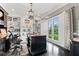 Home office featuring dark wood desk and cabinets, with natural light and a view of the outdoors at 4030 River Ridge Se, Marietta, GA 30067