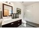 Modern bathroom featuring a vessel sink, and a glass-enclosed shower at 1242 Wild Creek Ne Trl, Atlanta, GA 30324