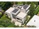 Modern home with solar panels and manicured landscaping, offering sustainable living and aesthetic appeal at 1242 Wild Creek Ne Trl, Atlanta, GA 30324