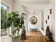 Welcoming foyer featuring hardwood floors, modern decor, and large windows providing ample natural light at 1242 Wild Creek Ne Trl, Atlanta, GA 30324