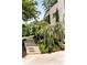 Lush landscaping with mature trees and manicured shrubs, leading to the home's entrance at 1242 Wild Creek Ne Trl, Atlanta, GA 30324