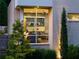 Bright living room with a large window offering natural light and scenic views of the landscaped yard at 1242 Wild Creek Ne Trl, Atlanta, GA 30324