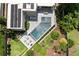 Aerial view of a luxurious backyard featuring a pool, spa, and beautifully landscaped surroundings for relaxation and entertainment at 1242 Wild Creek Ne Trl, Atlanta, GA 30324