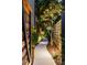 Inviting walkway lined with lush greenery, leading to a serene and private outdoor space at 1242 Wild Creek Ne Trl, Atlanta, GA 30324