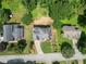 An overhead shot showing a residence with a well-maintained yard and mature trees surrounding the property at 130 Timber Oak Cv, Lawrenceville, GA 30043