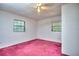 Simple bedroom with carpet and natural light at 2066 Tidwell Trl, Stone Mountain, GA 30088
