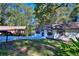 Charming single-story home boasts a fresh white exterior, complementing the verdant surroundings at 2066 Tidwell Trl, Stone Mountain, GA 30088