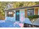 Charming home featuring a brick facade, symmetrical windows, and decorative shutters at 2066 Tidwell Trl, Stone Mountain, GA 30088