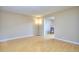 Bright living room with natural light, featuring hardwood floors and neutral-colored walls at 2066 Tidwell Trl, Stone Mountain, GA 30088
