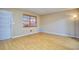 Bright living room with natural light, featuring hardwood floors and neutral-colored walls at 2066 Tidwell Trl, Stone Mountain, GA 30088