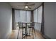 Balcony area featuring a modern ceiling fan, and bar style table for entertaining at 215 Piedmont Ne Ave # 804, Atlanta, GA 30308