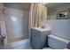 Bathroom featuring a shower and bathtub, along with a single sink vanity and toilet at 215 Piedmont Ne Ave # 804, Atlanta, GA 30308