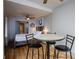 Bedroom featuring a queen size bed, and table with chairs on the patio at 215 Piedmont Ne Ave # 804, Atlanta, GA 30308