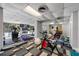 Well-equipped gym with modern exercise machines, free weights, and mirrored walls for a complete workout experience at 215 Piedmont Ne Ave # 804, Atlanta, GA 30308