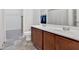 Bathroom featuring double vanity, toilet, and access to walk in closet at 3 Windsor Ct, Kingston, GA 30145