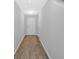 Clean entryway with hard surface flooring and a white front door at 3 Windsor Ct, Kingston, GA 30145
