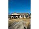 Charming single-story home with well-maintained lawn and inviting curb appeal on a sunny day at 415 Dove Ln, Social Circle, GA 30025