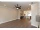 Living room features stylish built-ins, hardwood flooring, and an open layout to the modern kitchen at 530 Fisher Dr # 45, Alpharetta, GA 30009
