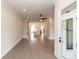 Inviting open-concept space connects the living area and modern kitchen with hardwood floors throughout at 530 Fisher Dr # 45, Alpharetta, GA 30009